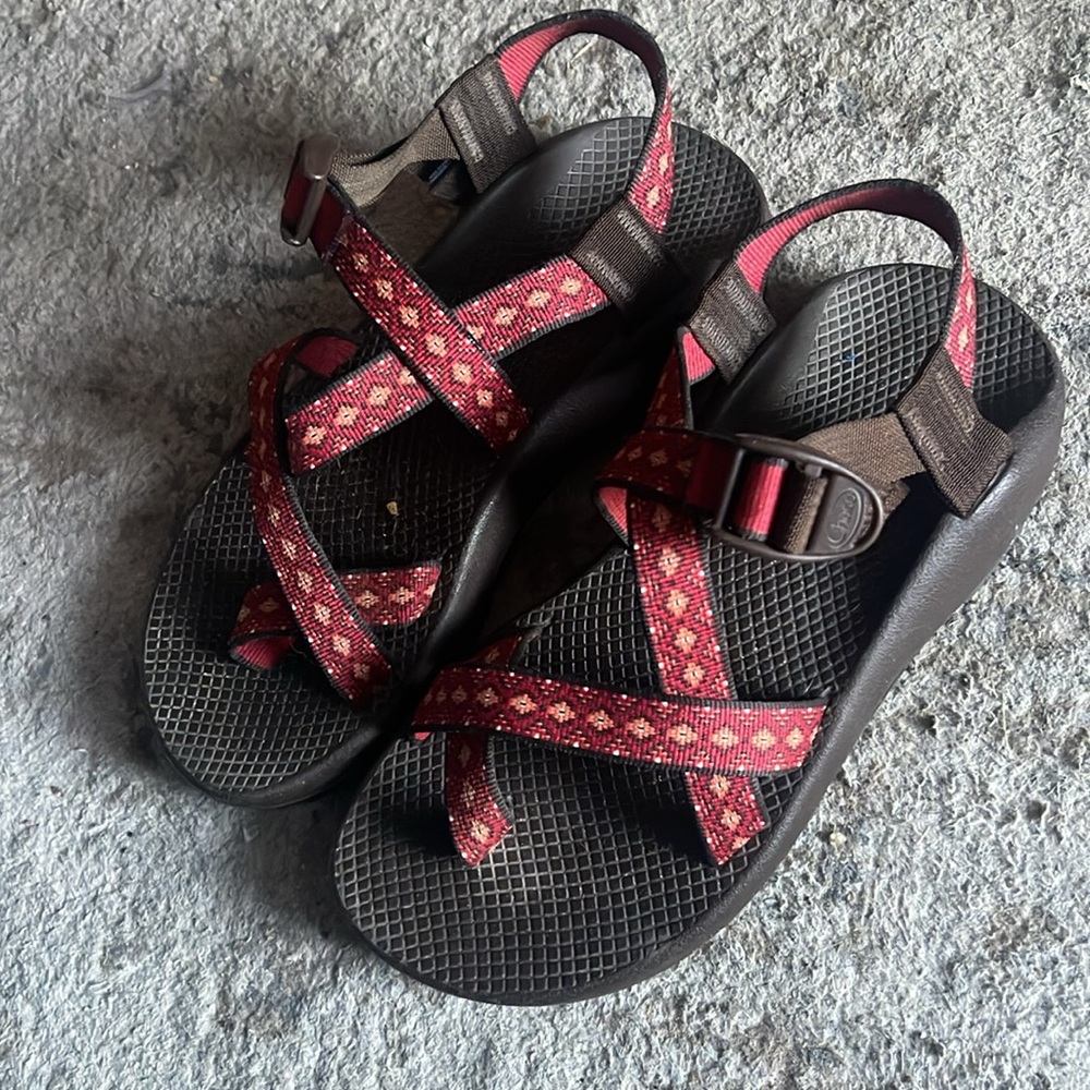 Chaco red orange and a hint of white sandals.  In GUC